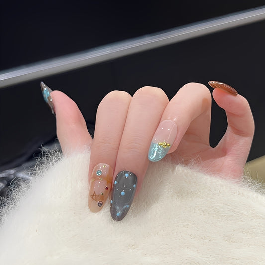 hand-painted reusable almond press-on nails with gold and turquoise floral design