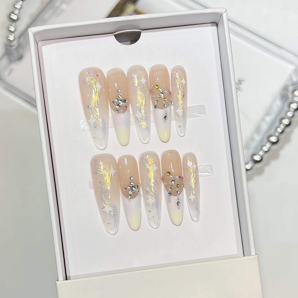 Extra long almond nude and white french tip handmade press-on nails with crystal accents