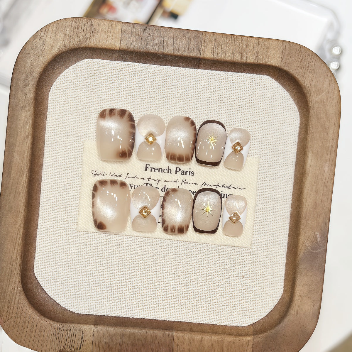 Short square handmade press-on nails with cat-eye shimmer and crocodile texture